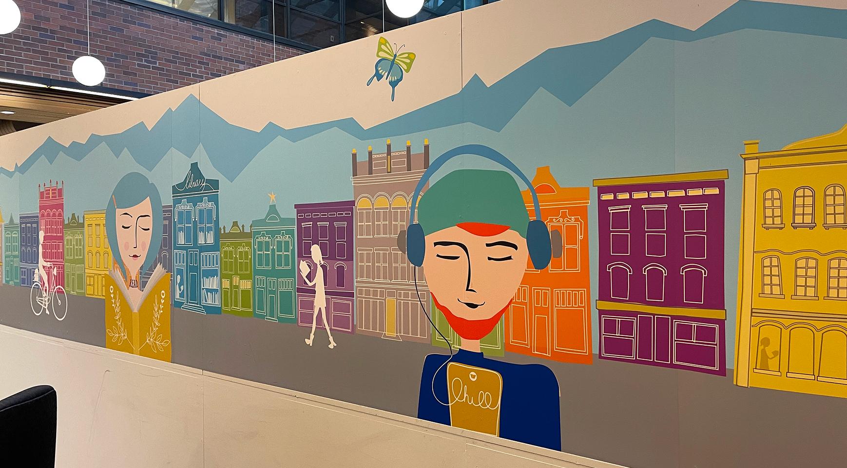 colourful mural behind a desk