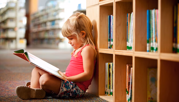little girl reading