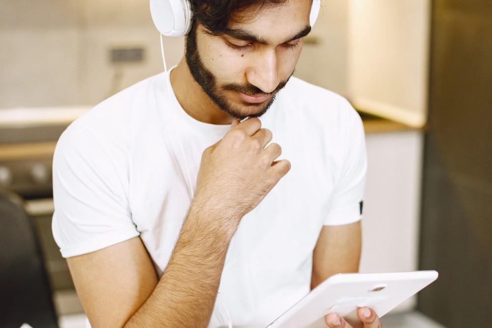Man listens to music on headphones