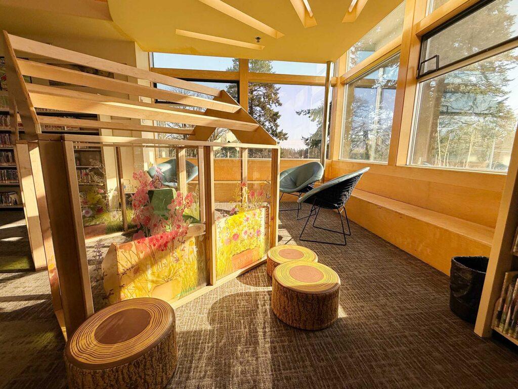 interior shot of little readers space shows chairs and reading nook