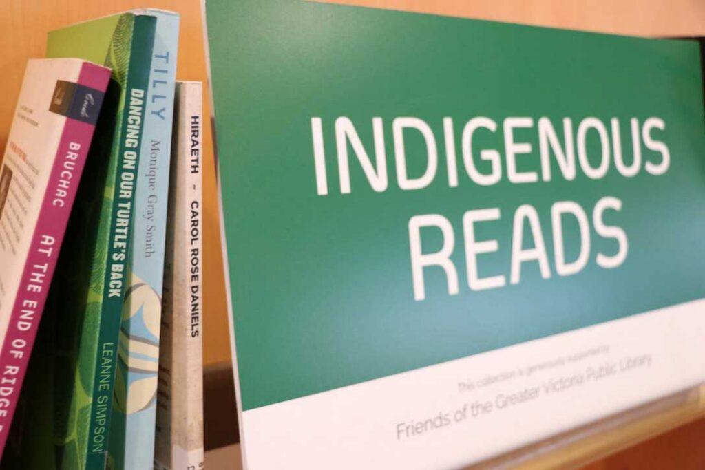 bookshelf with sign that reads: Indigenous reads