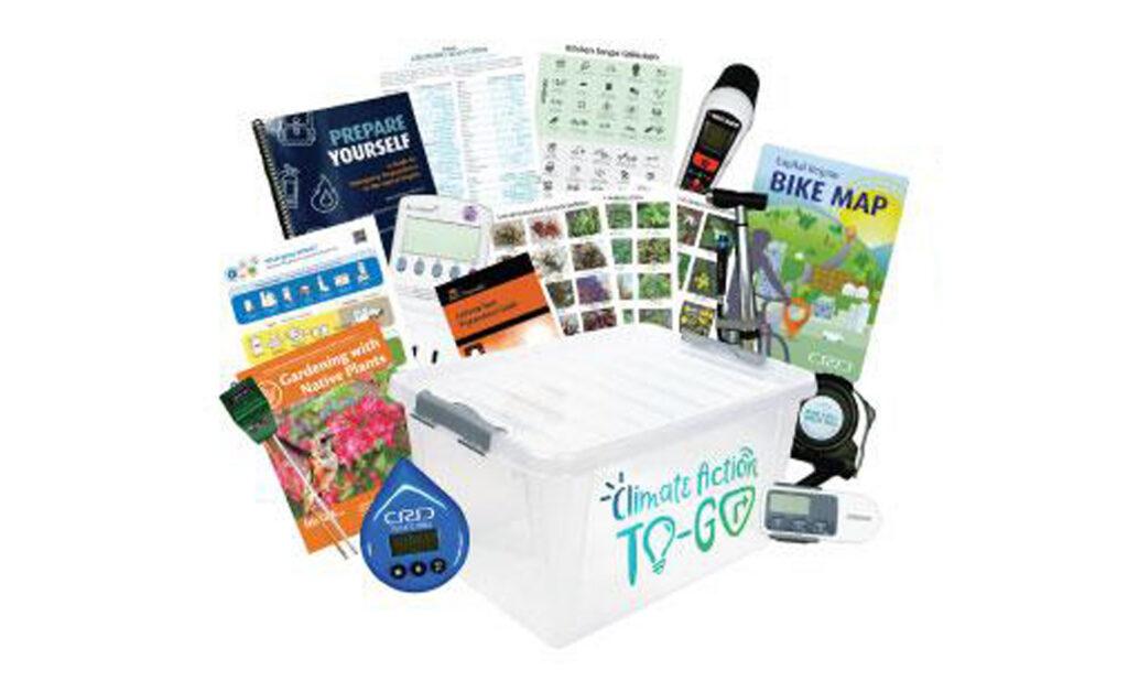 Climate Action To-Go Kit photo with box and contents showing.