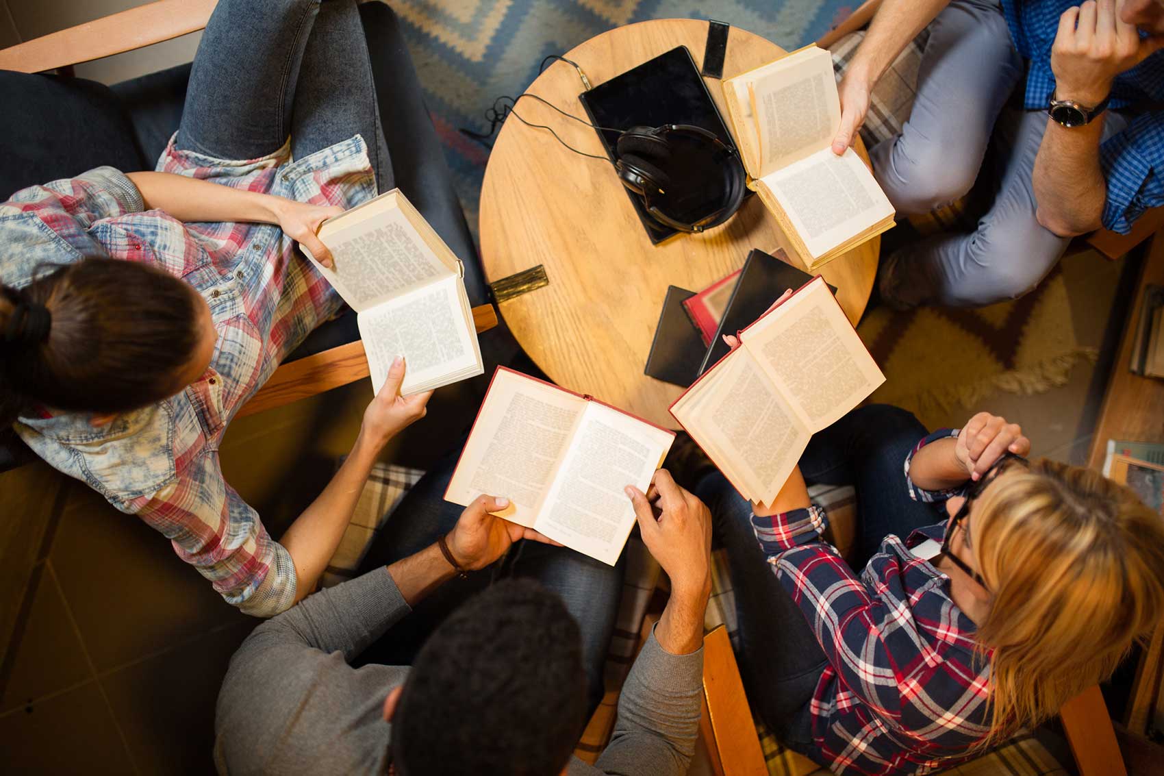 Adults reading books