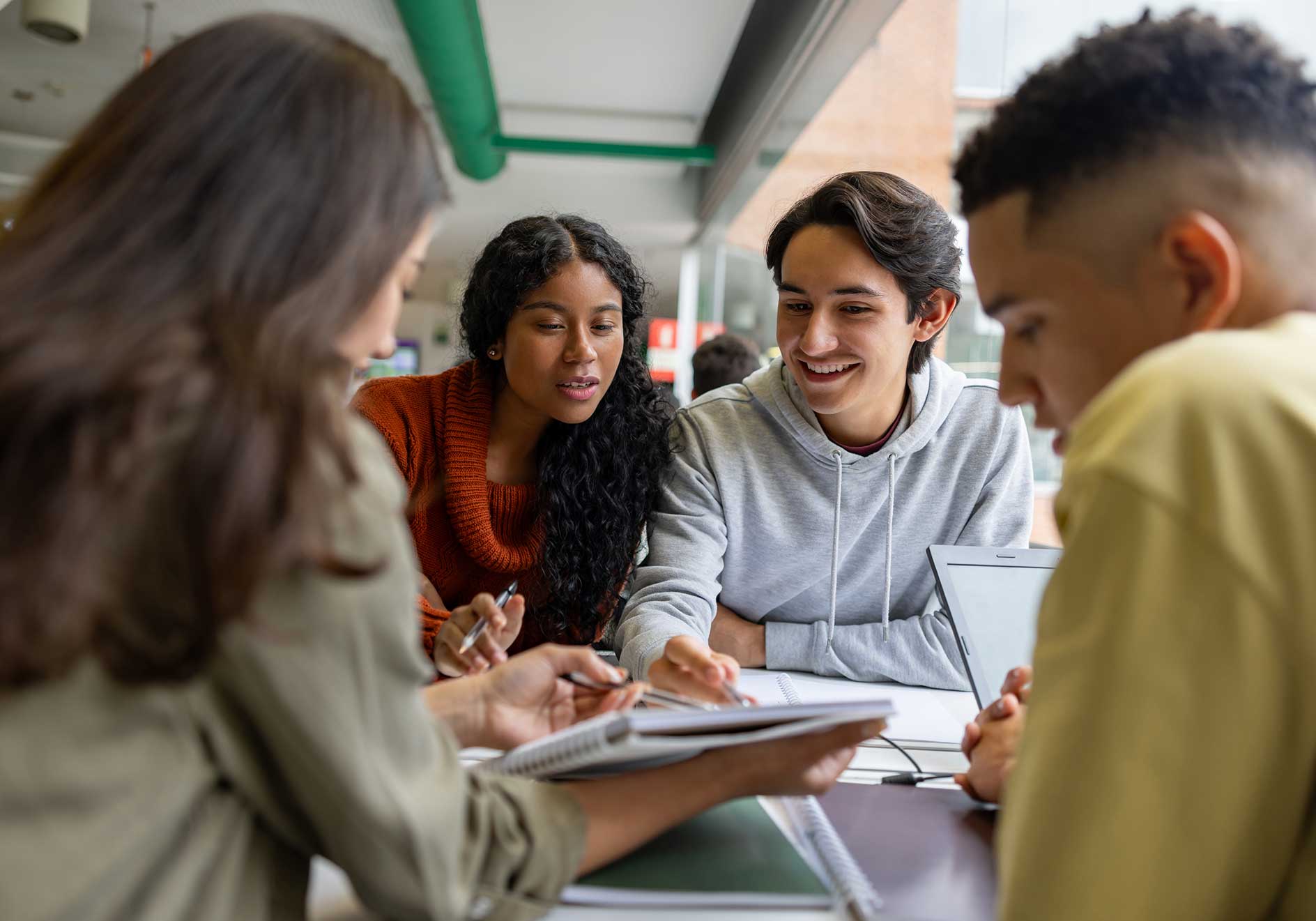 Youth gathered around notebook